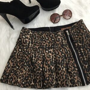 Royal Bones Pleated Leopard Print Mini Skirt with Zipper.